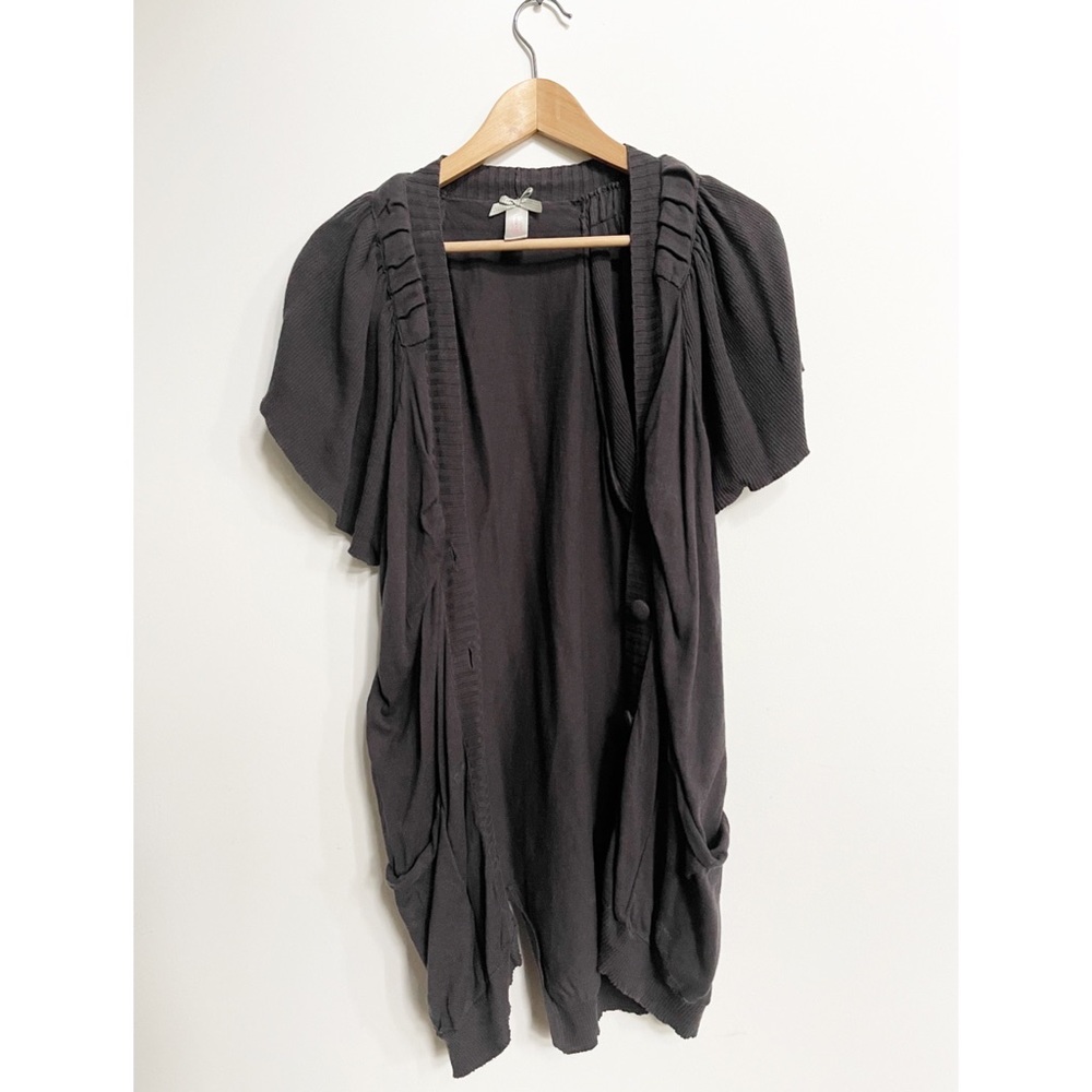 Grey knit short sleeve cardigan hits below the hips